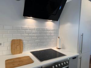 Kuchyň nebo kuchyňský kout v ubytování revLIVING Haus Clara am Berg mit kleinem Garten