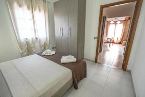 Posteľ alebo postele v izbe v ubytovaní Silvia Casa Vacanze