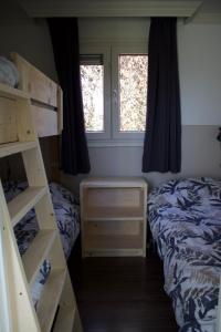 Giường trong phòng chung tại Chalet