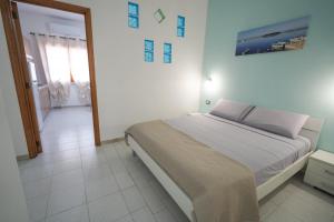 Posteľ alebo postele v izbe v ubytovaní Silvia Casa Vacanze