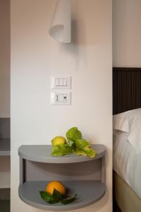 Voodi või voodid majutusasutuse Taormina charming rooms toas