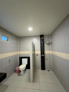 Ein Badezimmer in der Unterkunft High Life Villas