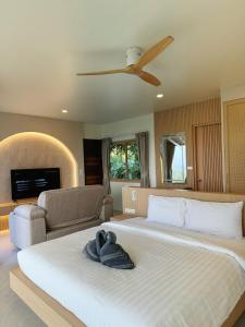 Ein Bett oder Betten in einem Zimmer der Unterkunft High Life Villas