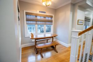 a home office with a desk and a window at The Newport Lofts - 611 Thames Street in Newport