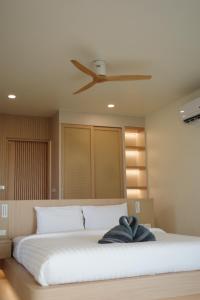 Ein Bett oder Betten in einem Zimmer der Unterkunft High Life Villas