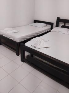 Ένα ή περισσότερα κρεβάτια σε δωμάτιο στο Apartamentos Coveñas TII +14 φωτογραφίες