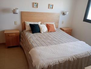 En eller flere senge i et værelse på El arenal vista al mar