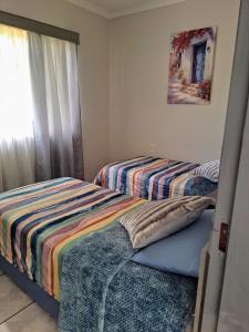 Ένα ή περισσότερα κρεβάτια σε δωμάτιο στο Casa Mia