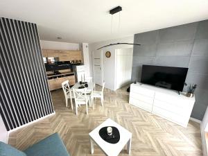 Η κουζίνα ή μικρή κουζίνα στο Apartament 65 +6 φωτογραφίες