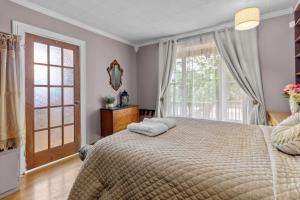 Katil atau katil-katil dalam bilik di Chez Michele 3 Bd Parking Yard