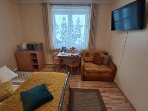 Posedenie v ubytovaní Pokoje u Ewy