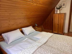 Letto o letti in una camera di Chata Jánošík