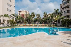 Bazén v ubytování Playa Marinsa Beach piscina y padel nebo v jeho okolí