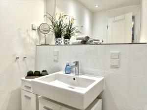 Koupelna v ubytování Ferienwohnung Urlaubsanker Villa Sofie Binz + 20 fotografií