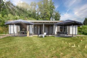 En have udenfor Ferienhaus Vilmblick 34 Feriendorf Klein Stresow Rügen by ruyastay