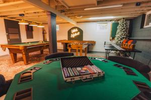 a poker room with a table with a tray on it at Family Pocono Gem by the lake with private sauna, hot tub, and huge game room in Arrowhead Lake