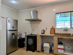 Kuchyň nebo kuchyňský kout v ubytování Un Oasis Natural a Minutos de Asunción