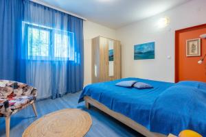 Postel nebo postele na pokoji v ubytování Apartments Mila