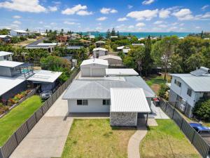 an aerial view of a residential neighbourhood with houses at Zilzie Beach House in Zilzie