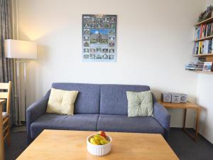 Ein Sitzbereich in der Unterkunft Gemütliches 2-Zimmer-Appartement mit Balkon.