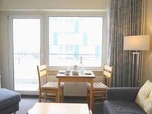 Ein Sitzbereich in der Unterkunft Gemütliches 2-Zimmer-Appartement mit Balkon.