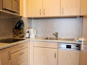 Küche/Küchenzeile in der Unterkunft Gemütliches 2-Zimmer-Appartement mit Balkon.