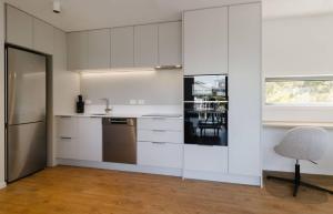 Η κουζίνα ή μικρή κουζίνα στο unit 6 Hospital Road Wellington