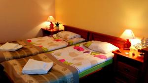 Posteľ alebo postele v izbe v ubytovaní Hotel Spinaker