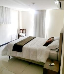 Llit o llits en una habitació de Amplio Apartamento a metros de shoping del sol