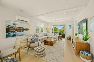 a living room with a couch and a table at Angler's Cove at Hunter's Point in Cortez