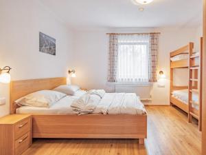 Postel nebo postele na pokoji v ubytování Haus Filzstein