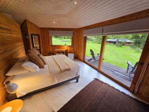 Ліжко або ліжка в номері Peuma Lodge Patagonia