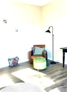 a living room with a couch and a table at Newly Built Spacious Quiet 3 Bed Rm House with Backyard and Parking in Midland
