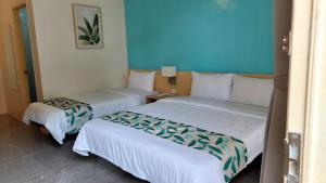 Letto o letti in una camera di SeTu Divespot & Resort