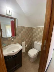 Et badeværelse på ValeriaS Duplex