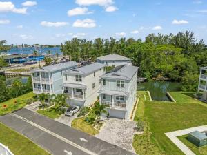 an aerial view of a house with a river at Sea Salt at Hunter's Point in Cortez