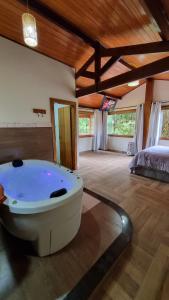 Voodi või voodid majutusasutuse Pousada Muro de Pedra toas