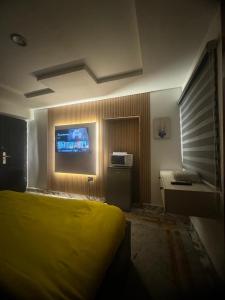 Mynd úr myndasafni af Camp David Cozy Studio Wuse 1 with 24hrs Power í Abuja +16 myndir