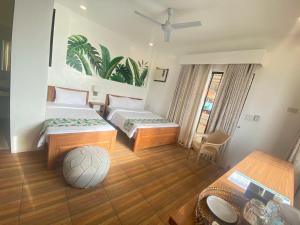 Letto o letti in una camera di SeTu Divespot & Resort