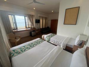 Letto o letti in una camera di SeTu Divespot & Resort