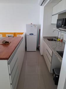 Η κουζίνα ή μικρή κουζίνα στο Apartamento en la playa de Piriápolis
