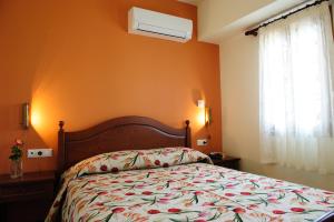 Ένα ή περισσότερα κρεβάτια σε δωμάτιο στο Alisahni Beachfront Villas