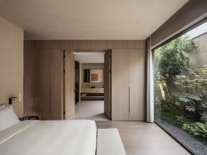 西安央辰酒店 Younch Hotel Xi'an客房内的一张或多张床位