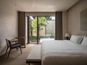 西安央辰酒店 Younch Hotel Xi'an客房内的一张或多张床位
