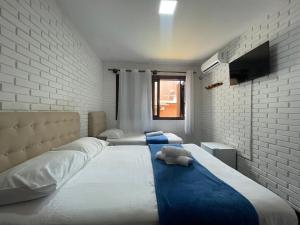 Katil atau katil-katil dalam bilik di Mare Blu - Pousada Hostel