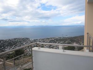a view of the ocean from a balcony at Viva B&B in Anavyssos