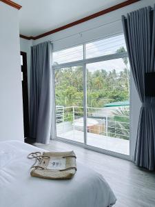 Giường trong phòng chung tại Inner Peace Homestay Phan Thiet