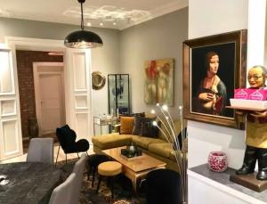 Et opholdsområde på Vakker, svært sentral leilighet med 3 soverom