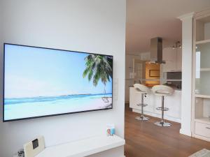 Una televisión o centro de entretenimiento en Brandenburger Straße 5b, Whg.7