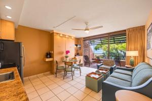a living room with a couch and a kitchen at Kuleana Club #510 - Ocean View -1 bedroom & 1 bathroom - 2nd Floor in Kahana +37 photos